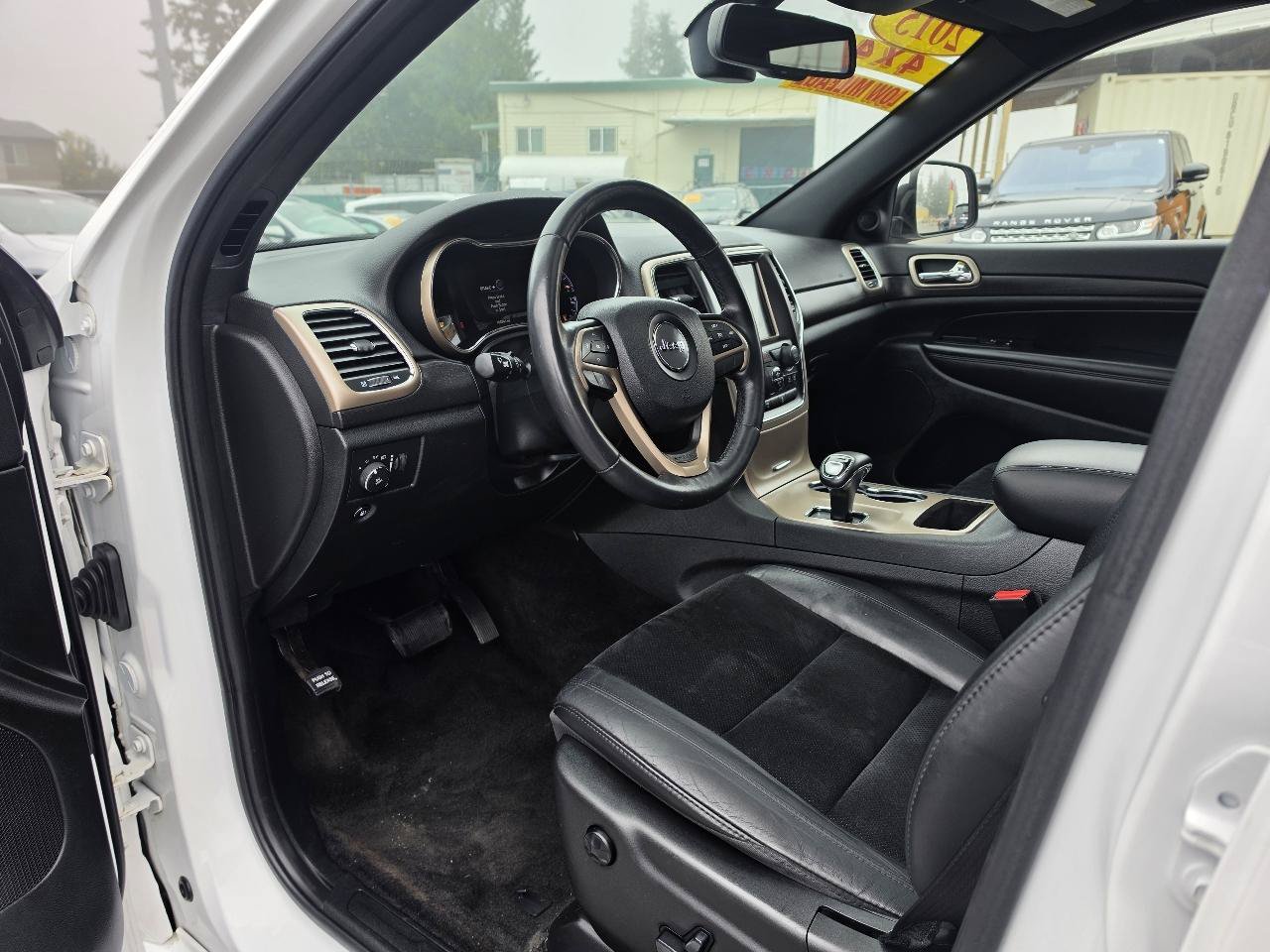 Used 2015 Jeep Grand Cherokee Altitude AWD/4WD image 12