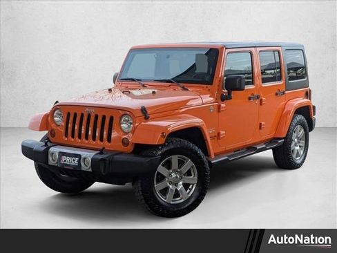 Used 2012 Jeep Wrangler Unlimited Sahara w/ Dual Top Group image 1