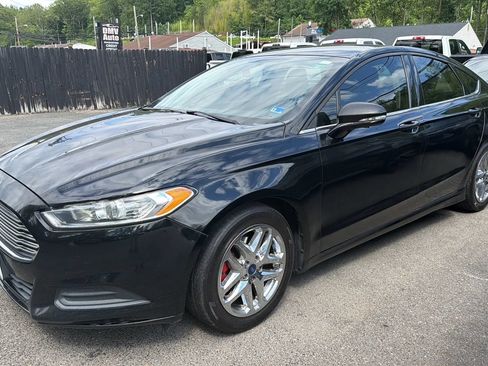Used 2016 Ford Fusion SE FWD image 1
