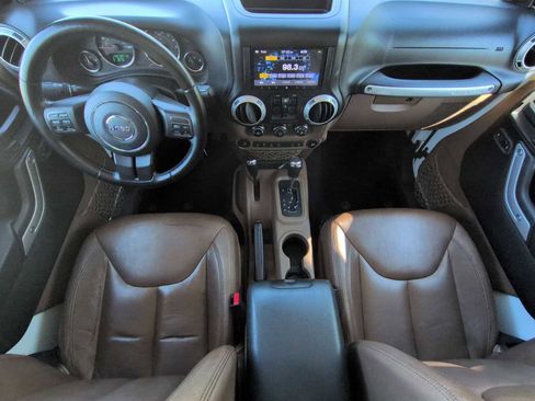 Used 2014 Jeep Wrangler Unlimited Sahara w/ Dual Top Group AWD/4WD image 14