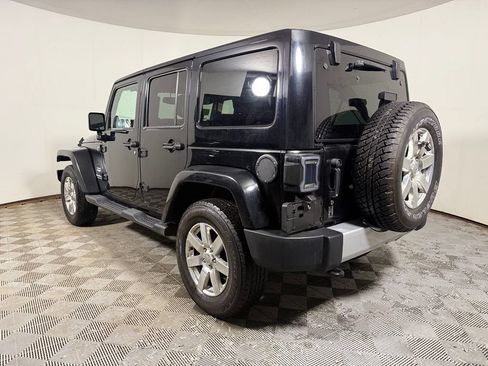 Used 2014 Jeep Wrangler Unlimited Sahara w/ Dual Top Group AWD/4WD image 4