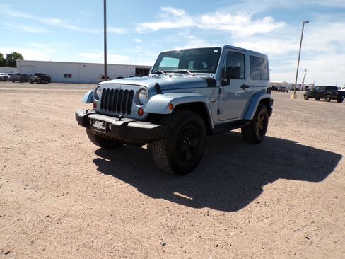 Used 2012 Jeep Wrangler Sahara AWD/4WD image 1