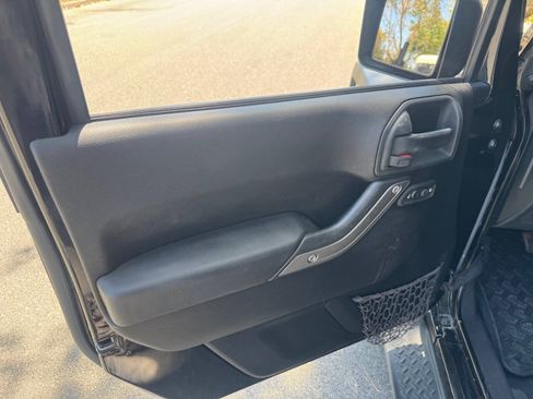 Used 2015 Jeep Wrangler Unlimited Sport w/ Dual Top Group AWD/4WD image 11