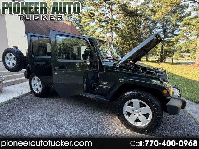 Used 2011 Jeep Wrangler Unlimited Sahara w/ Connectivity Group AWD/4WD image 1