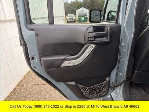 Used 2014 Jeep Wrangler Unlimited Sahara w/ Dual Top Group AWD/4WD image 27