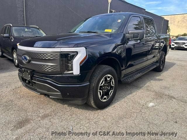 Used 2023 Ford F150 Lightning XLT AWD/4WD image 1