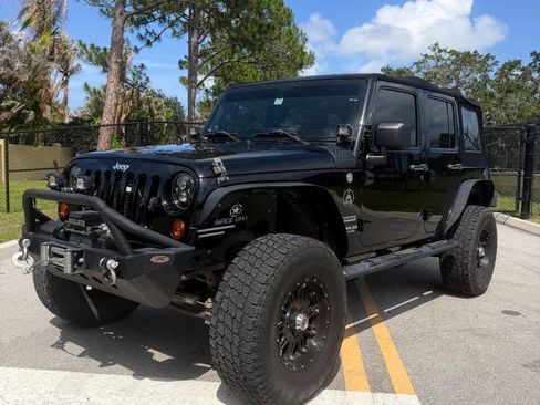 Used 2011 Jeep Wrangler Unlimited Sport AWD/4WD image 2