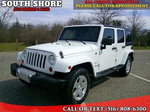 Used 2012 Jeep Wrangler Unlimited Sahara w/ Dual Top Group image 1