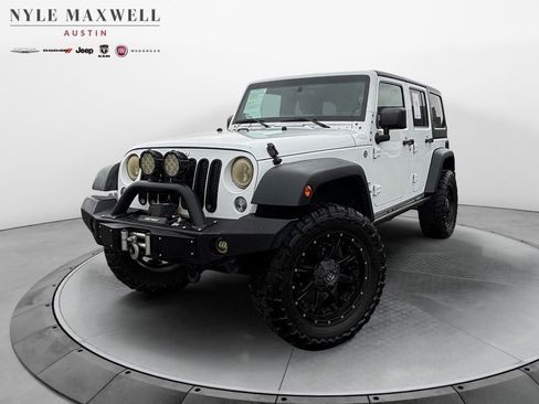 Used 2014 Jeep Wrangler Unlimited Sport w/ Connectivity Group AWD/4WD image 1
