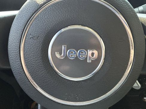 Used 2013 Jeep Wrangler Unlimited Sahara w/ Dual Top Group AWD/4WD image 23