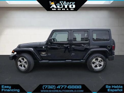 Used 2014 Jeep Wrangler Unlimited Sahara w/ Dual Top Group AWD/4WD image 8