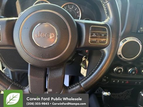 Used 2014 Jeep Wrangler Unlimited Sahara w/ Dual Top Group AWD/4WD image 17