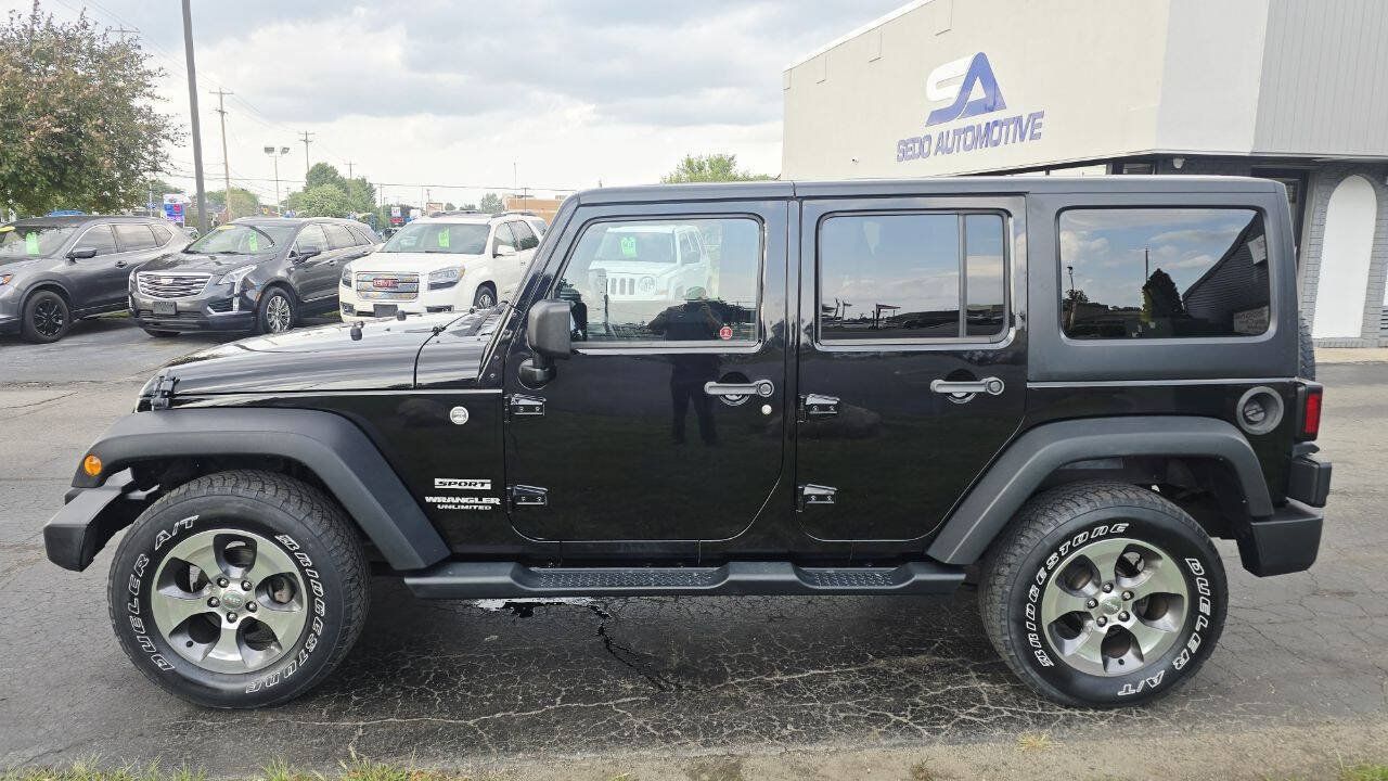 Used 2014 Jeep Wrangler Unlimited Sport w/ Dual Top Group AWD/4WD image 3