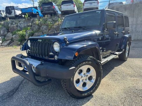 Used 2013 Jeep Wrangler Unlimited Sahara w/ Dual Top Group AWD/4WD image 2