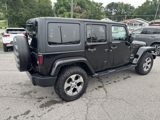 Used 2017 Jeep Wrangler Unlimited Sahara AWD/4WD video 3