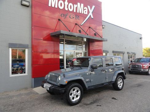 Used 2014 Jeep Wrangler Unlimited Sahara w/ Connectivity Group image 1