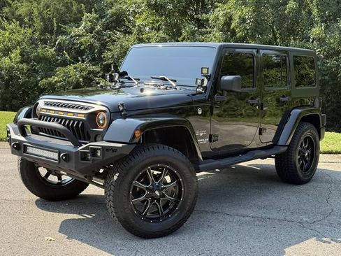 Used 2017 Jeep Wrangler Unlimited Sahara AWD/4WD image 1