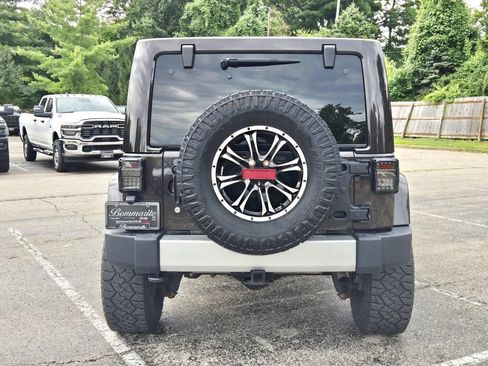Used 2013 Jeep Wrangler Unlimited Sahara w/ Dual Top Group AWD/4WD image 4