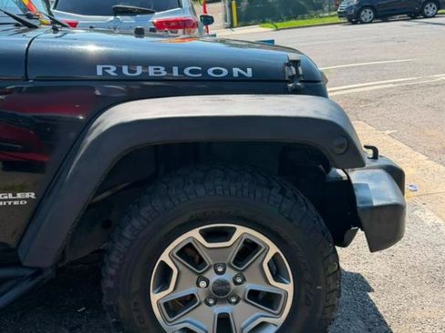 Used 2016 Jeep Wrangler Unlimited Rubicon w/ Dual Top Group AWD/4WD image 17