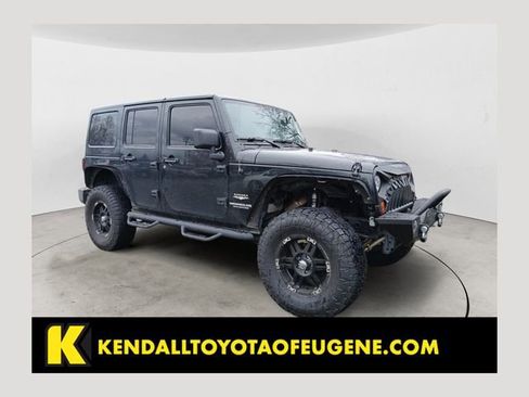 Used 2012 Jeep Wrangler Unlimited Sahara w/ Connectivity Group image 1