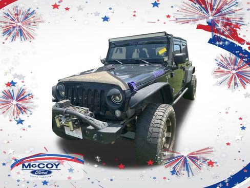 Used 2014 Jeep Wrangler Unlimited Sport AWD/4WD image 1