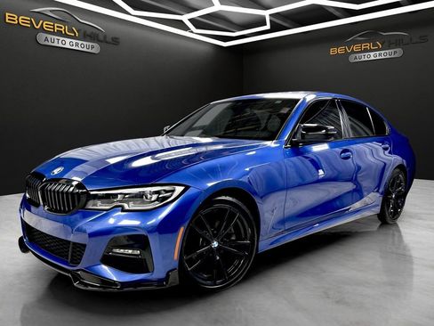 Used 2021 BMW 330i xDrive Sedan w/ M Sport Package image 1