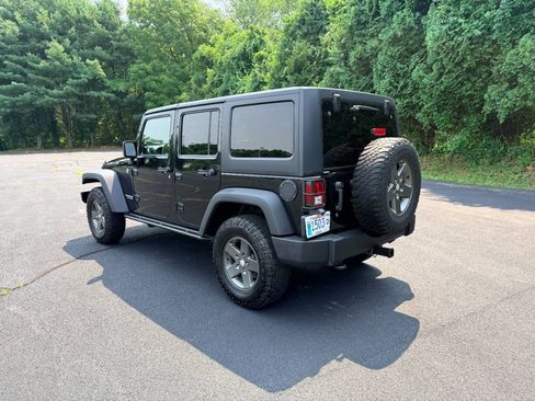 Used 2011 Jeep Wrangler Unlimited Rubicon w/ Dual Top Group AWD/4WD image 6