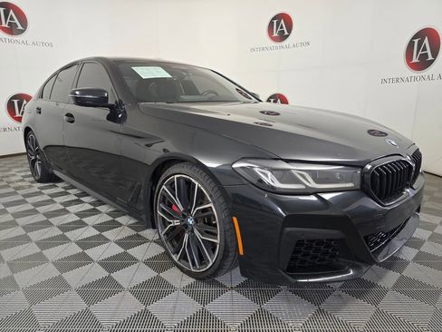 Used 2023 BMW M550i xDrive w/ Executive Package AWD/4WD image 1