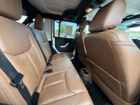 Used 2013 Jeep Wrangler Unlimited Sahara w/ Dual Top Group AWD/4WD image 14