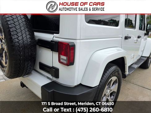 Used 2016 Jeep Wrangler Unlimited Sahara w/ Dual Top Group AWD/4WD image 14