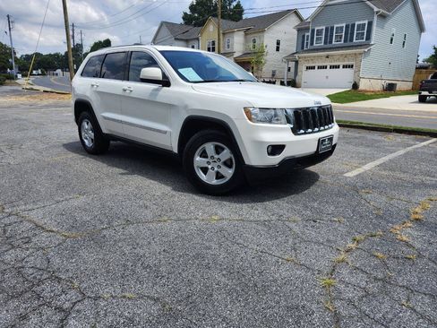 Used 2012 Jeep Grand Cherokee Laredo w/ Laredo E Group AWD/4WD image 1