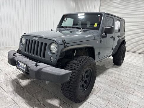 Used 2015 Jeep Wrangler Unlimited Rubicon w/ Connectivity Group AWD/4WD image 1