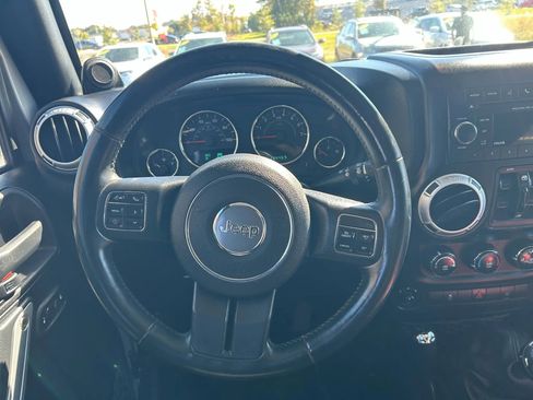 Used 2014 Jeep Wrangler Unlimited Sahara w/ Dual Top Group image 12