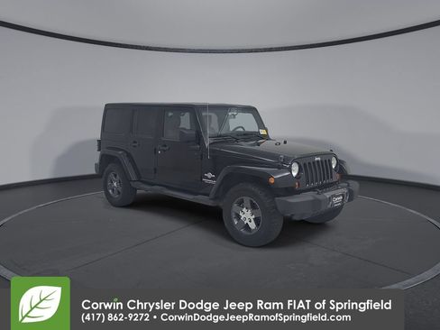 Used 2011 Jeep Wrangler Unlimited Sport w/ Connectivity Group AWD/4WD image 3