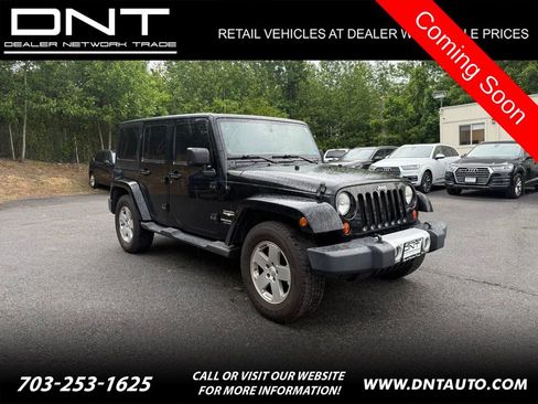 Used 2011 Jeep Wrangler Unlimited Sahara w/ Connectivity Group AWD/4WD image 1