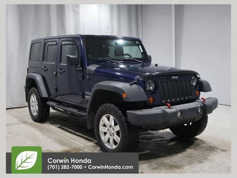 Used 2013 Jeep Wrangler Unlimited Sport image 1