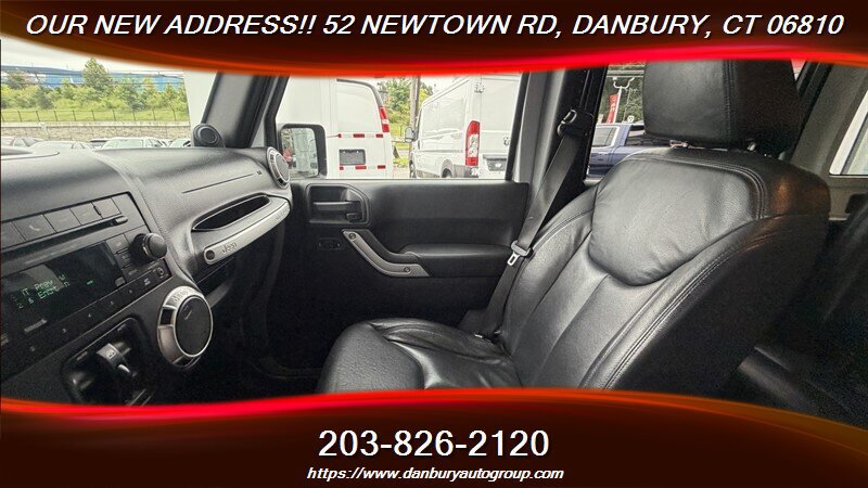 Used 2014 Jeep Wrangler Unlimited Sahara w/ Dual Top Group AWD/4WD image 12