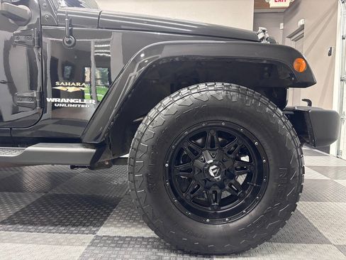 Used 2013 Jeep Wrangler Unlimited Sahara w/ Dual Top Group AWD/4WD image 5