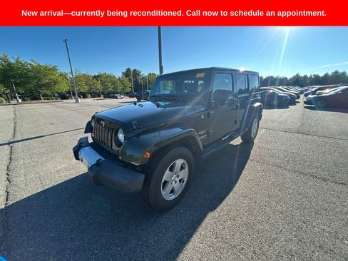 Used 2011 Jeep Wrangler Unlimited Sahara w/ Dual Top Group AWD/4WD image 11