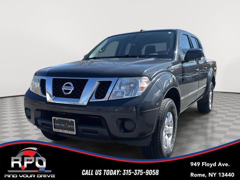 Used 2013 Nissan Frontier SV image 1