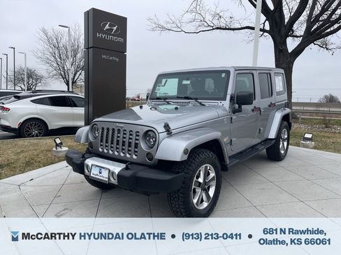 Used 2014 Jeep Wrangler Unlimited Sahara AWD/4WD image 1