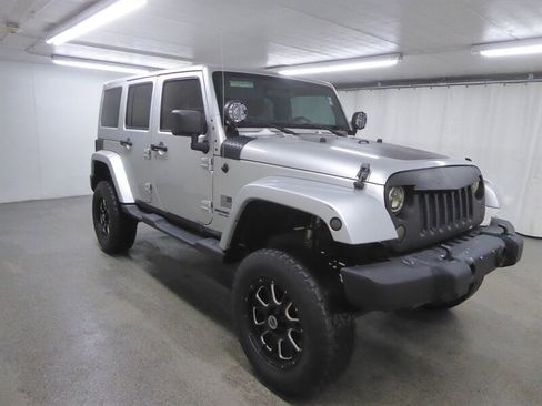 Used 2011 Jeep Wrangler Unlimited Sahara w/ Dual Top Group image 1
