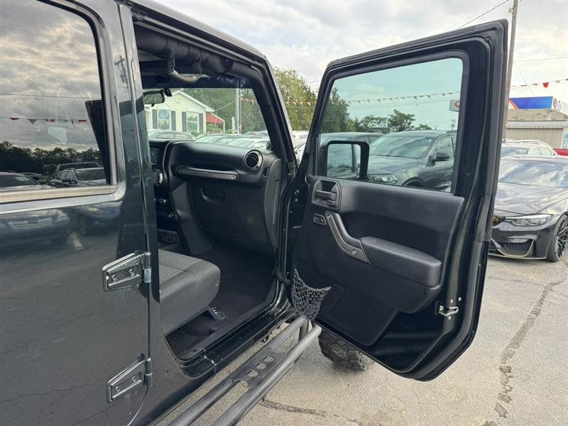 Used 2012 Jeep Wrangler Unlimited Sport AWD/4WD image 14
