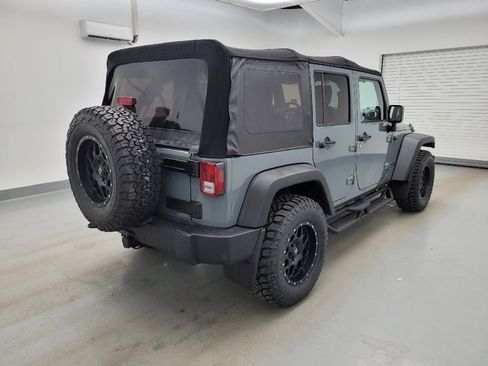 Used 2014 Jeep Wrangler Unlimited Rubicon w/ Dual Top Group AWD/4WD image 9