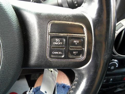 Used 2014 Jeep Wrangler Unlimited Sahara w/ Dual Top Group AWD/4WD image 25