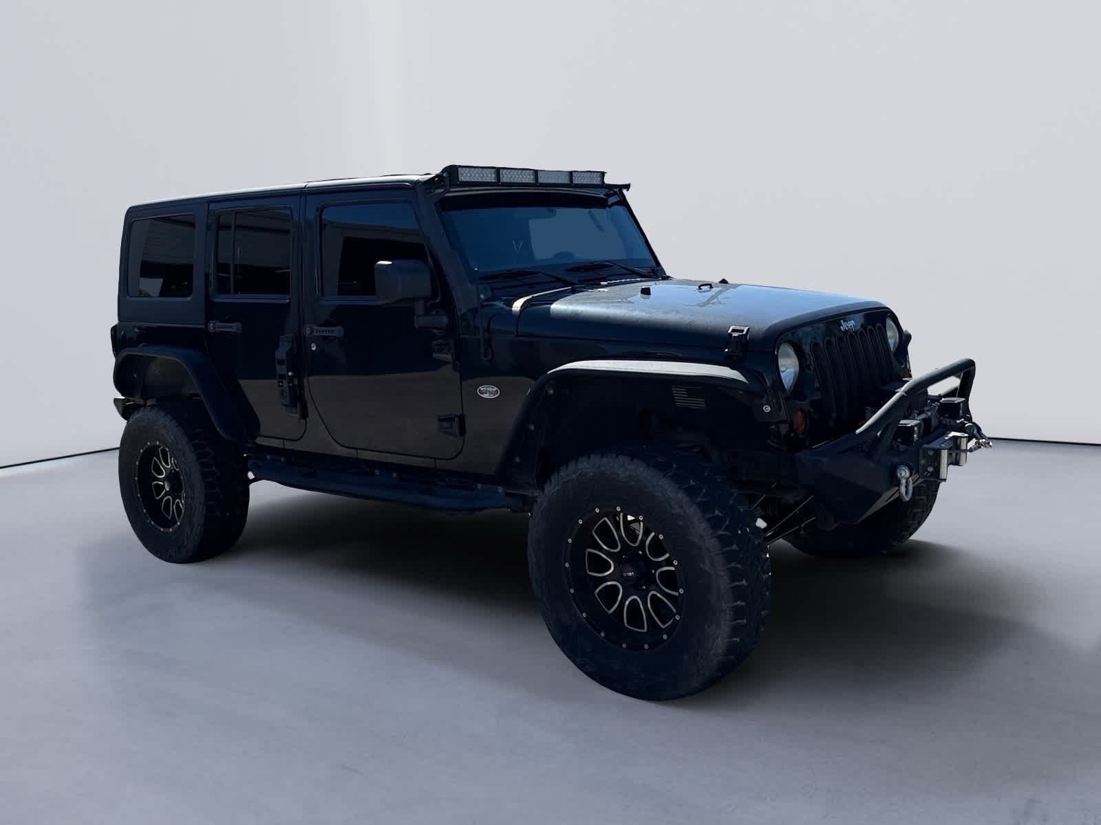 Used 2012 Jeep Wrangler Unlimited Sport AWD/4WD image 2