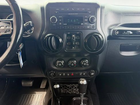 Used 2012 Jeep Wrangler Unlimited Sahara AWD/4WD image 13