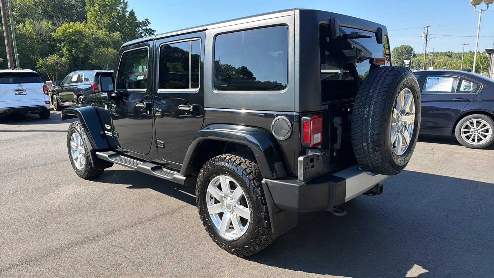 Used 2013 Jeep Wrangler Unlimited Sahara w/ Dual Top Group AWD/4WD image 7