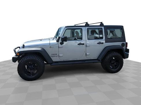 Used 2017 Jeep Wrangler Unlimited Sport w/ Mopar Black Appearance Group AWD/4WD image 1