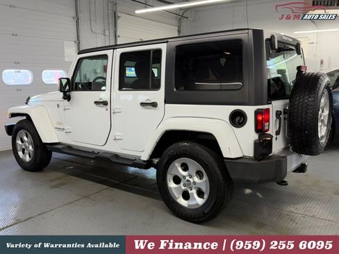Used 2015 Jeep Wrangler Unlimited Sahara w/ Dual Top Group AWD/4WD image 11